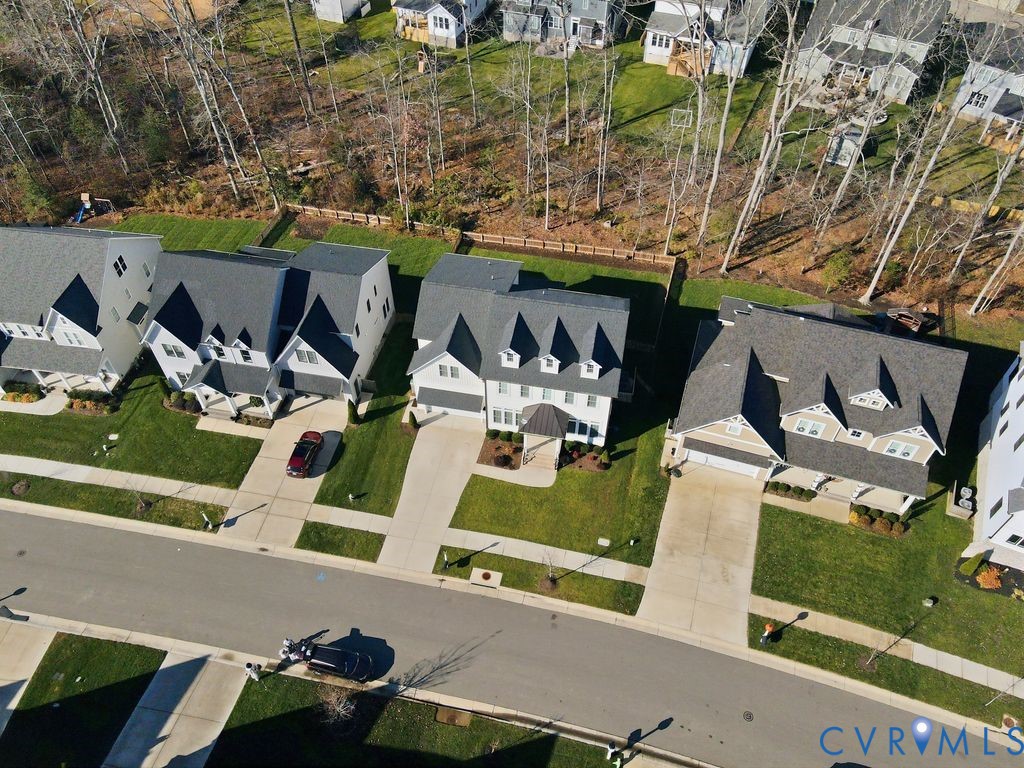 3818 Bellstone Drive Midlothian, VA 23112 - Photo 2 of 35 an aerial view of a house with a yard and seating area
