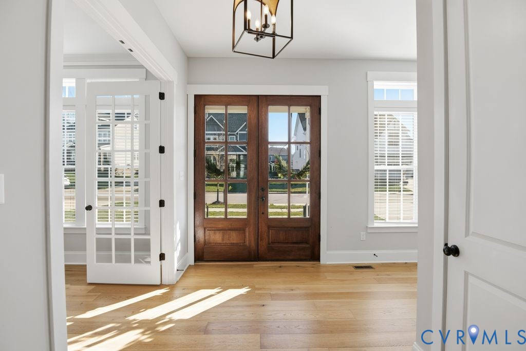 3818 Bellstone Drive Midlothian, VA 23112 - Photo 3 of 35 a view of an empty room with glass door