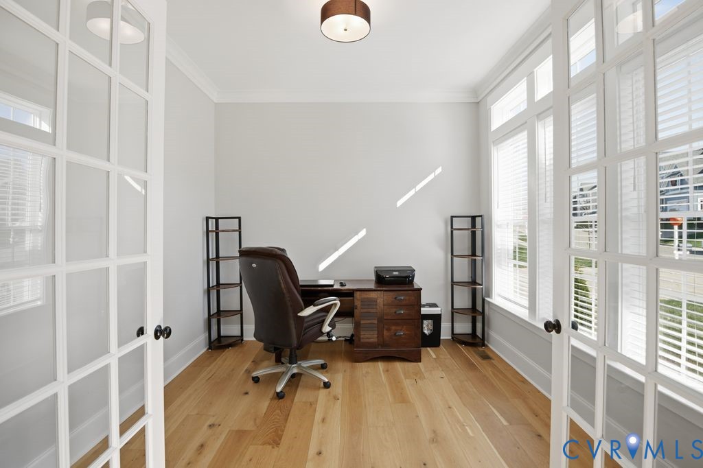 3818 Bellstone Drive Midlothian, VA 23112 - Photo 5 of 35 a view of a workspace with furniture and a window