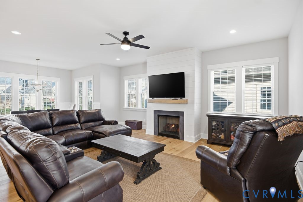 3818 Bellstone Drive Midlothian, VA 23112 - Photo 6 of 35 a living room with furniture and a fireplace