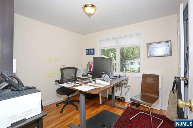 84 12th Street Cresskill, NJ 07626 - Photo 32 of 45 a work room with furniture and a window