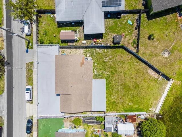 a view of swimming pool from a balcony