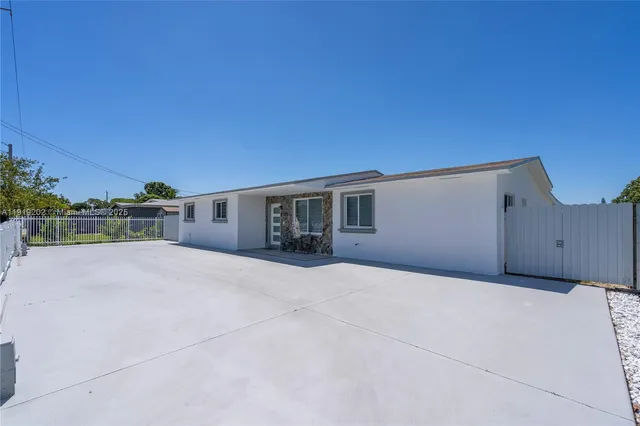 a house view with a outdoor space