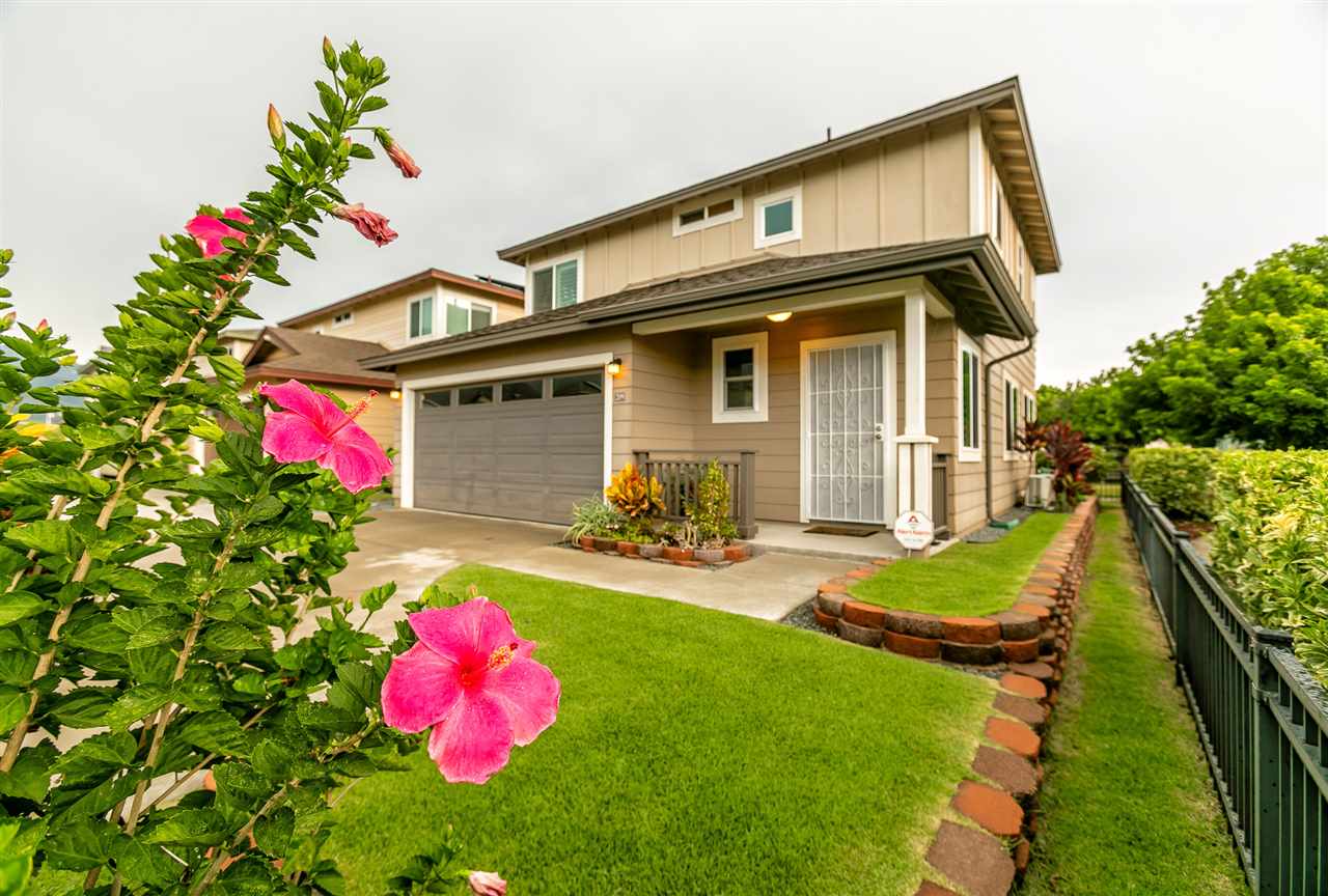 a front view of house with yard