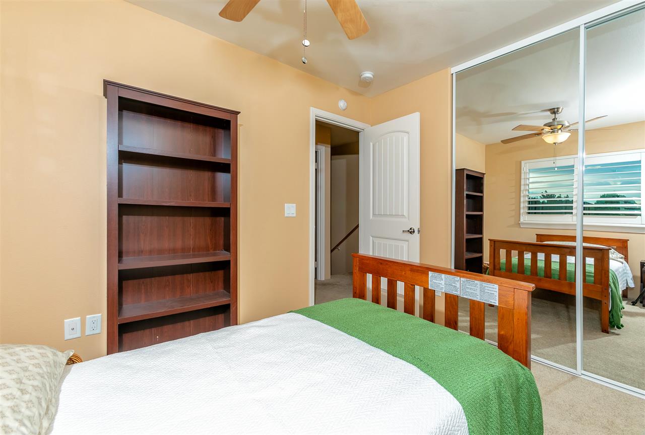 209 Alake Street Kahului, HI 96732 - Photo 13 of 30 a bedroom with a bed and a window