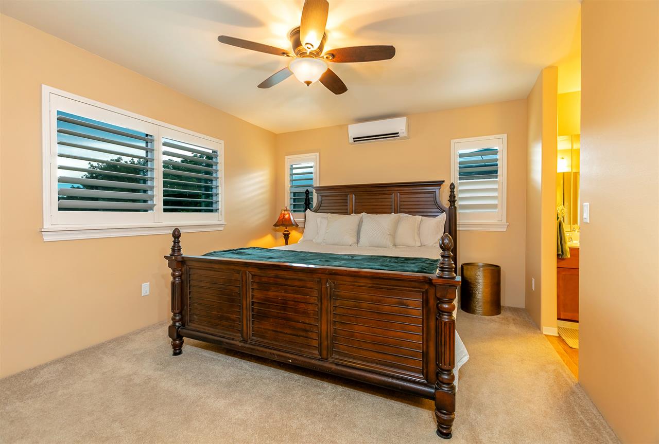 209 Alake Street Kahului, HI 96732 - Photo 14 of 30 a bedroom with a bed and a window