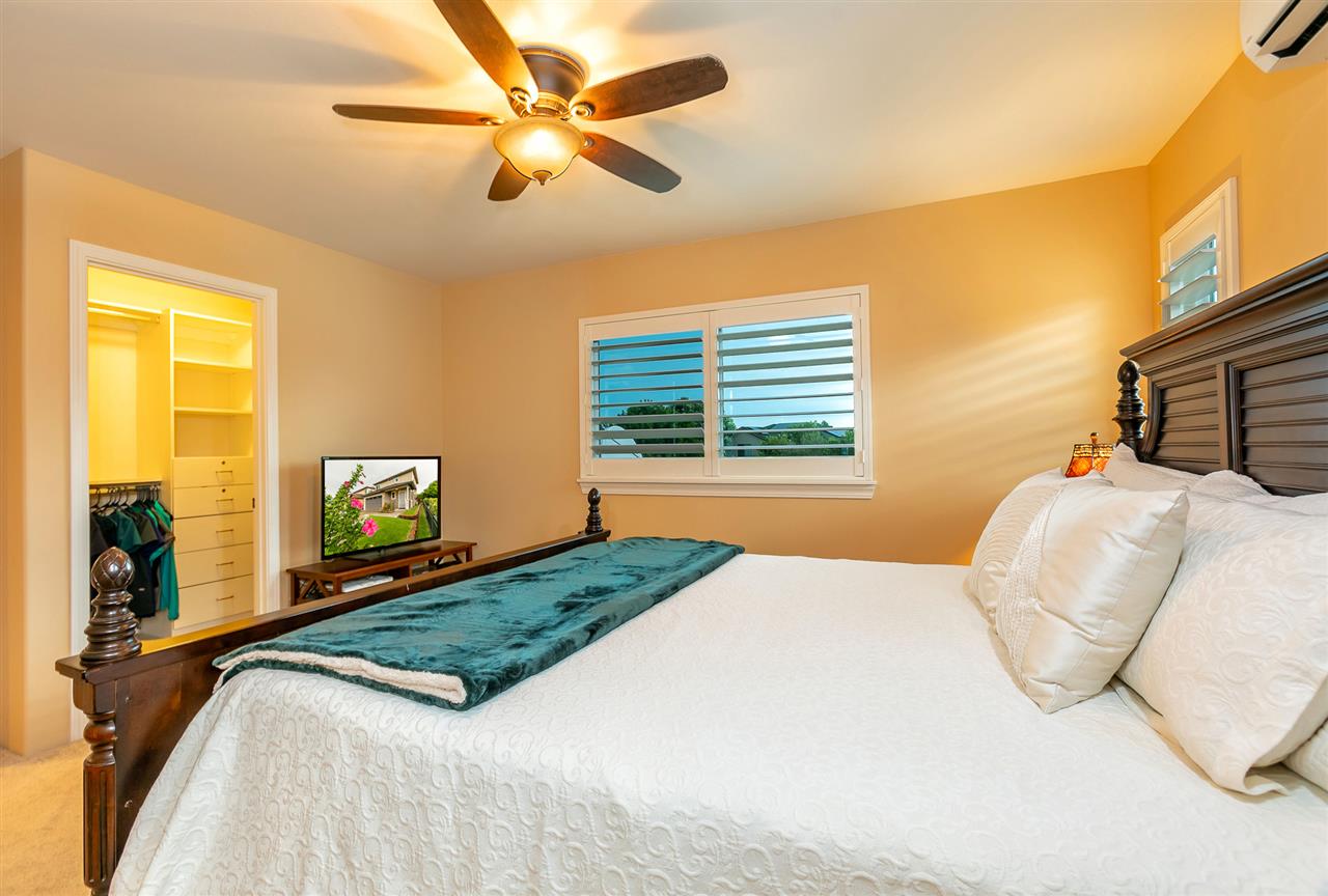 209 Alake Street Kahului, HI 96732 - Photo 16 of 30 a bedroom with a large bed and a window