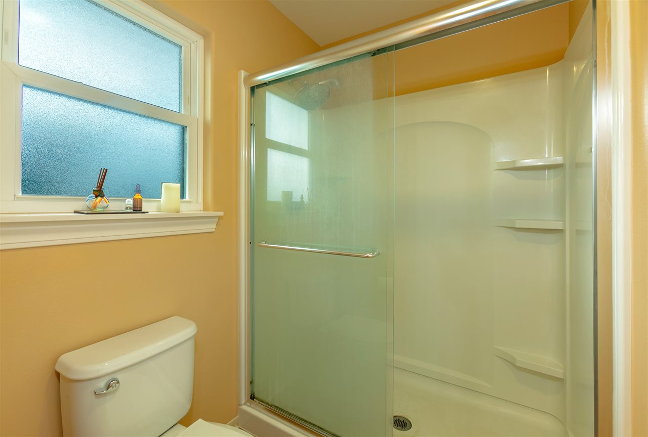 209 Alake Street Kahului, HI 96732 - Photo 18 of 30 a bathroom with a shower a toilet and sink