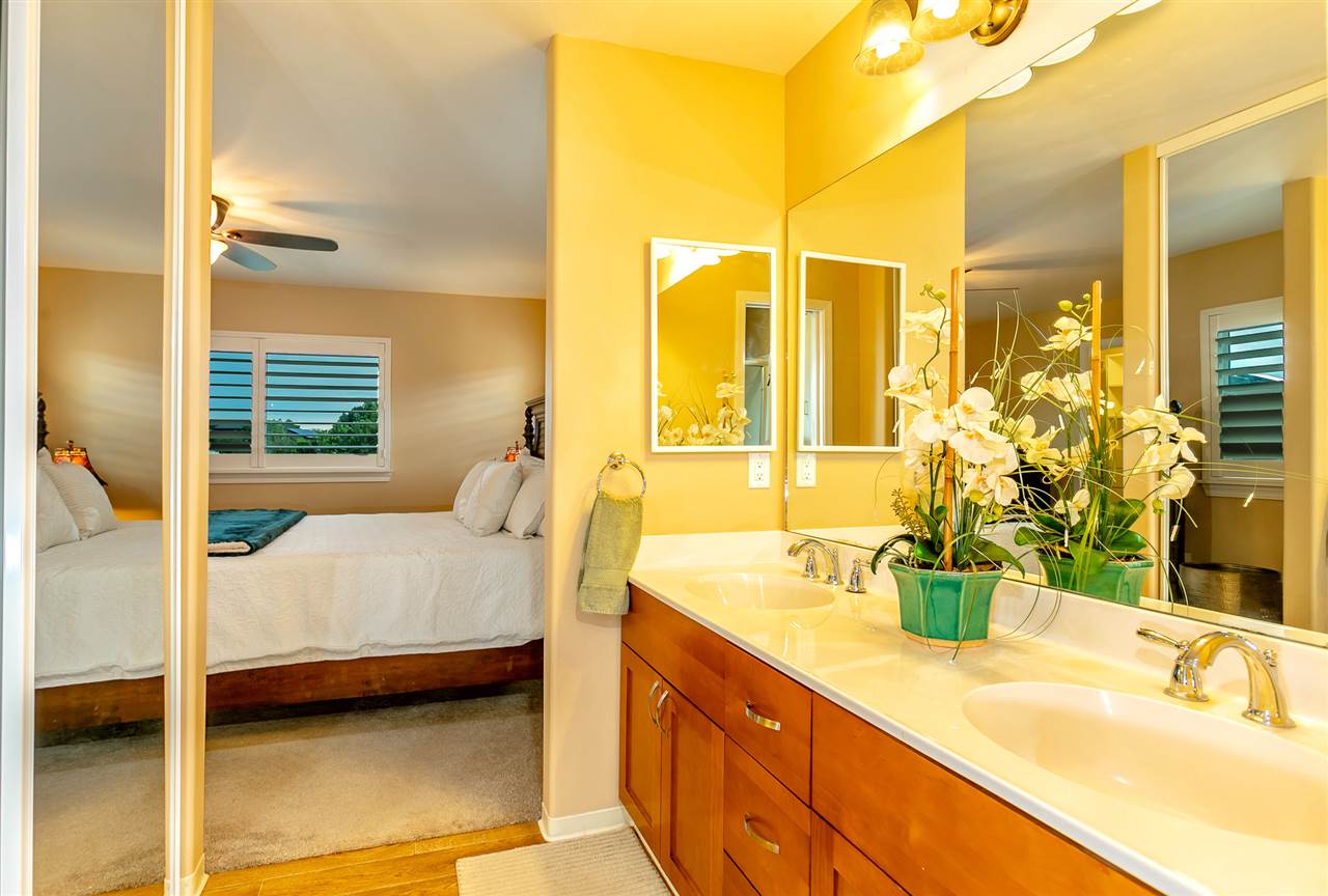 209 Alake Street Kahului, HI 96732 - Photo 19 of 30 a en suite bathroom with a granite countertop double vanity and a mirror