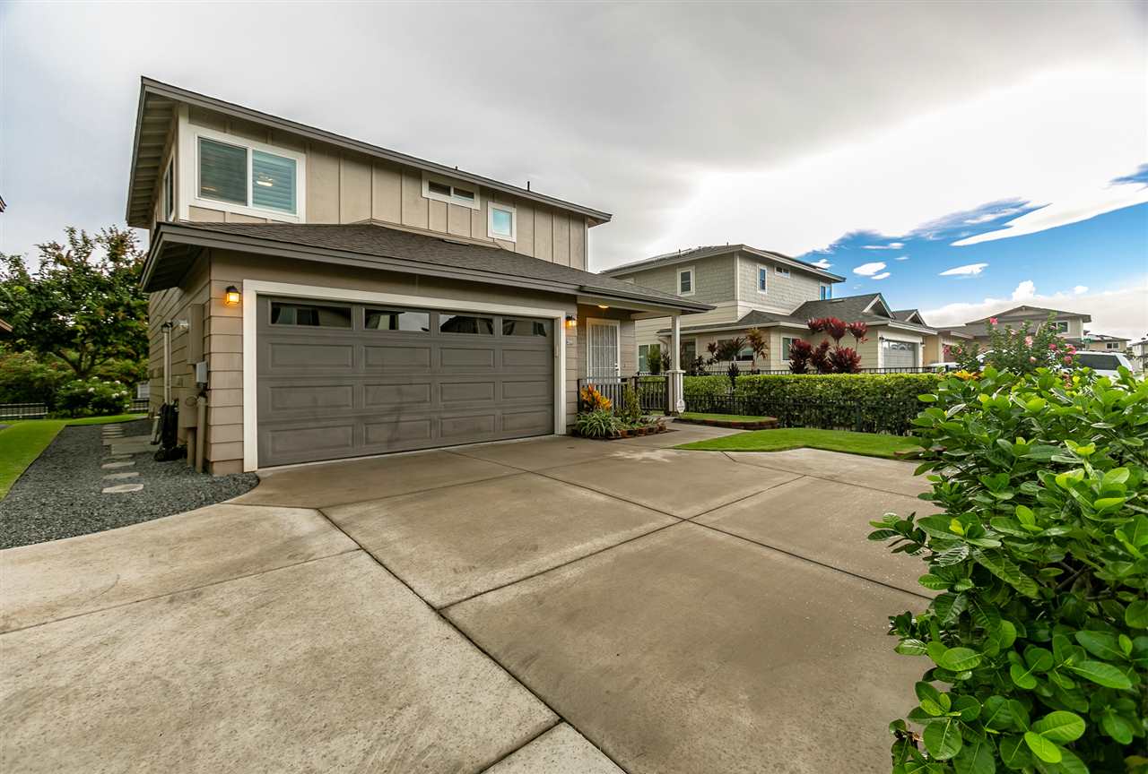 209 Alake Street Kahului, HI 96732 - Photo 27 of 30 a front view of a house with a yard and garage