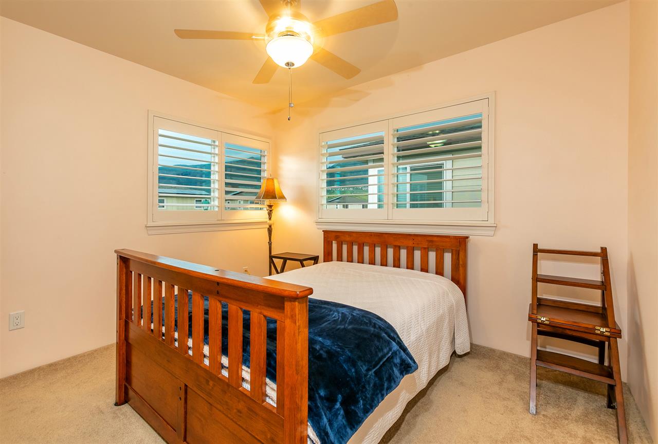 209 Alake Street Kahului, HI 96732 - Photo 10 of 30 a bedroom with a bed and a window