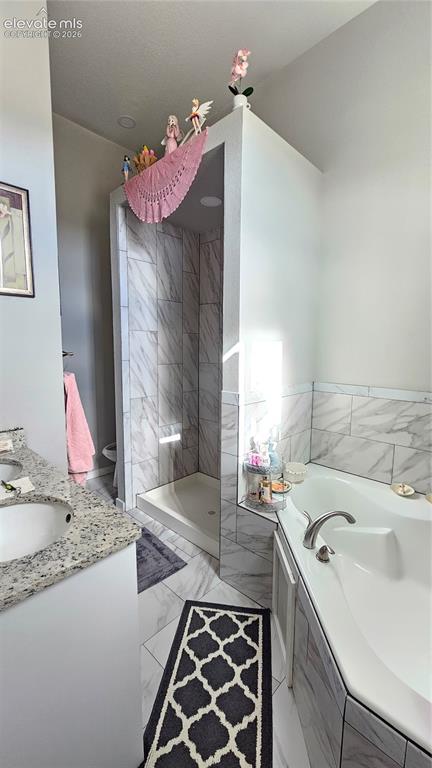 3835 Sengbeil Road Yoder, CO 80864 - Photo 24 of 48 a bathroom with a sink and a mirror