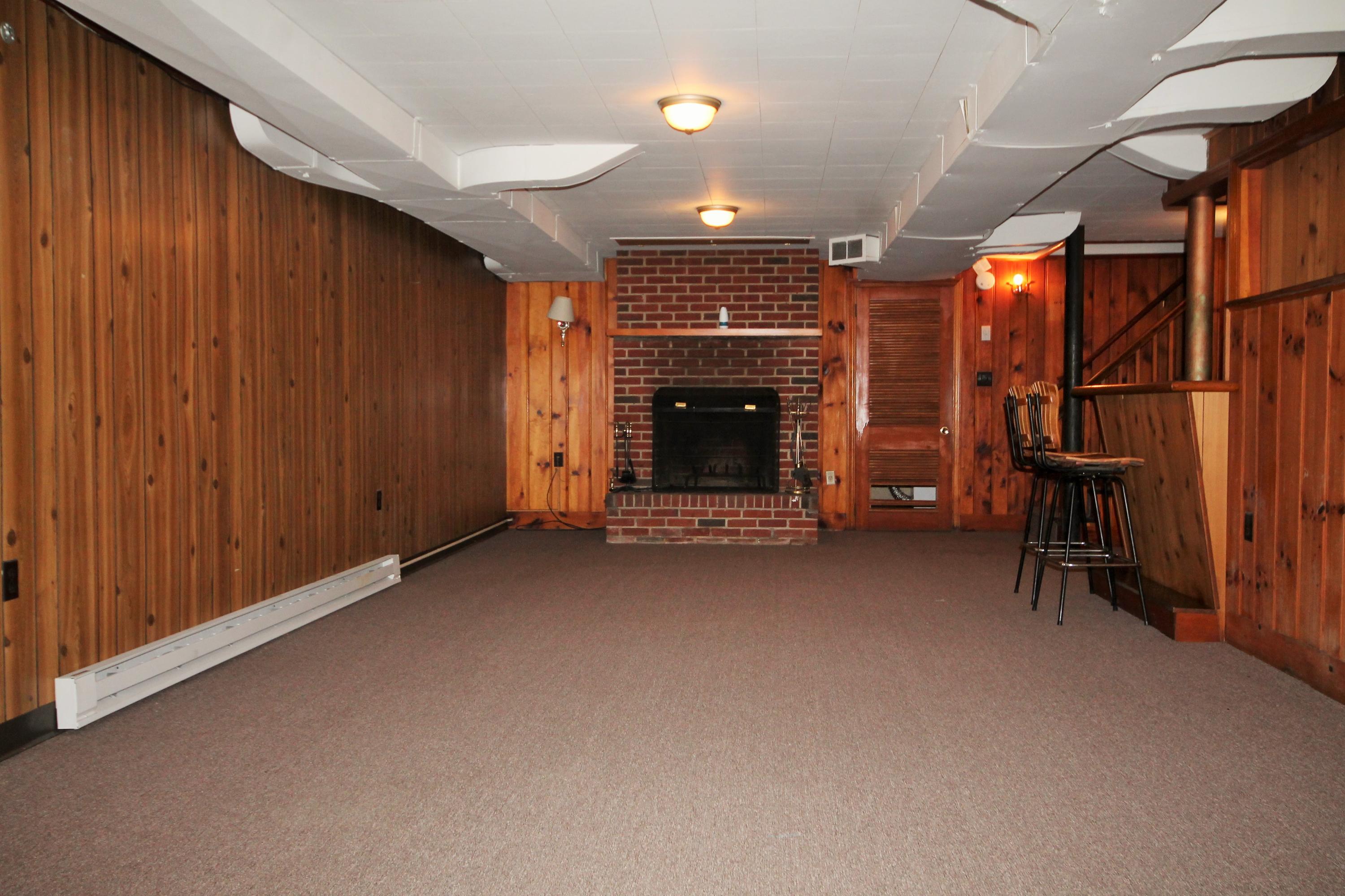 2364 Howard Road Southwest Roanoke, VA 24015 - Photo 16 of 17 a view of an empty room with a fireplace