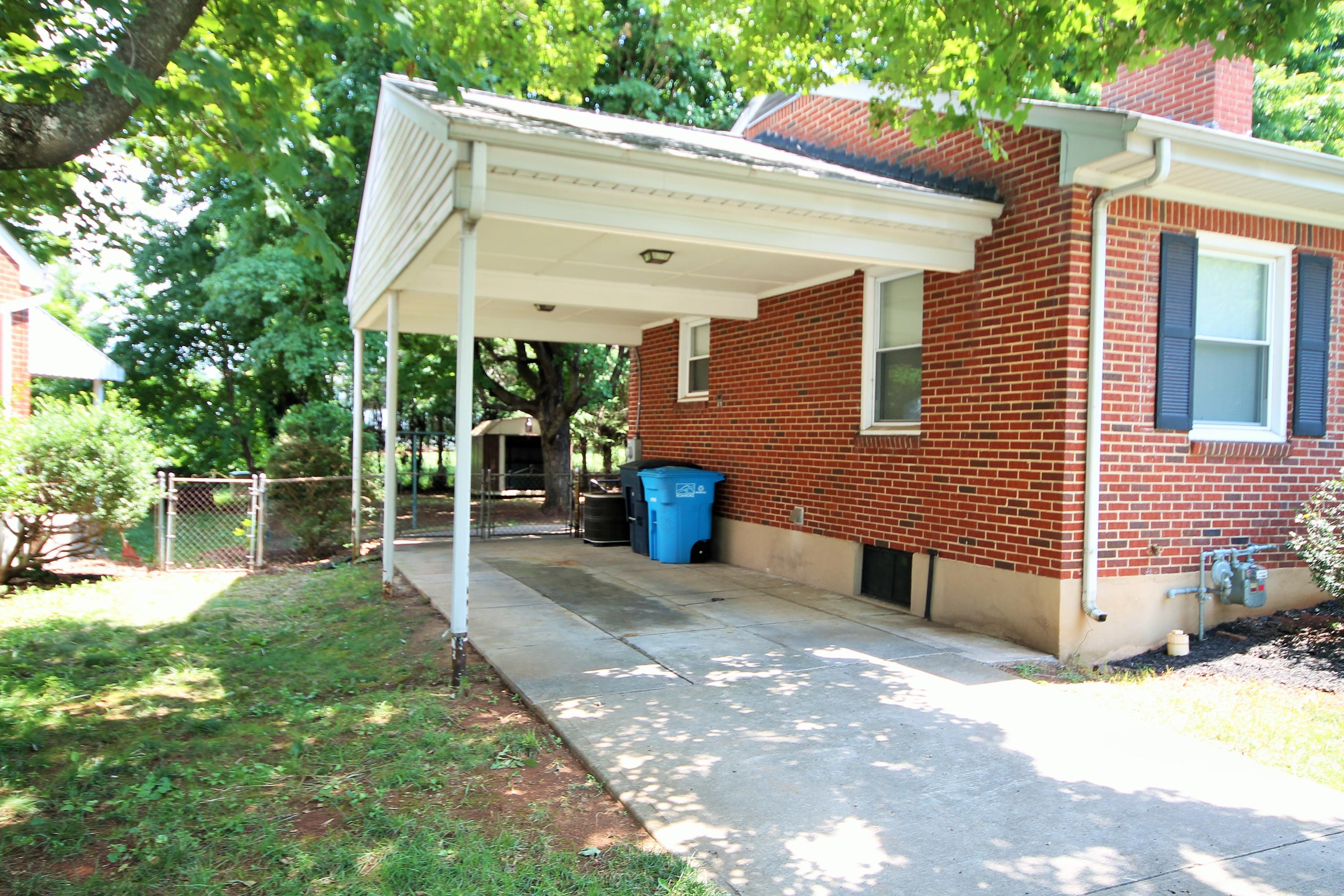 2364 Howard Road Southwest Roanoke, VA 24015 - Photo 4 of 17 a view of a house with backyard and garden