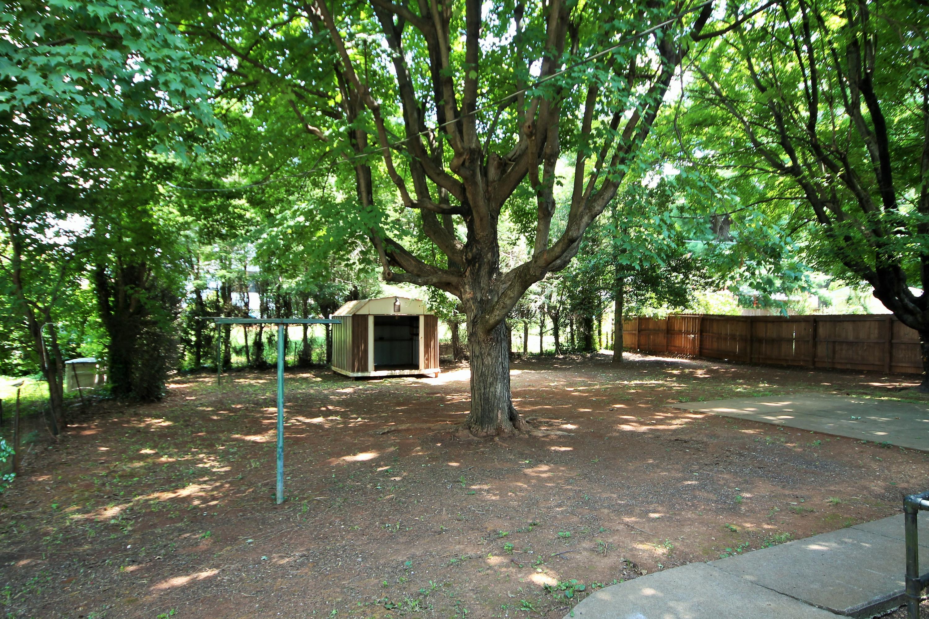 2364 Howard Road Southwest Roanoke, VA 24015 - Photo 5 of 17 a front view of a house with a tree s
