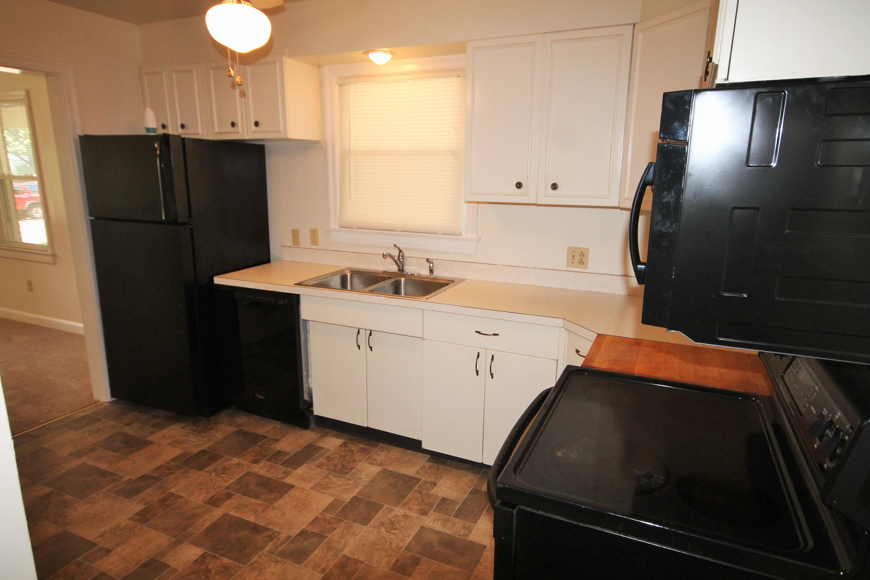 2364 Howard Road Southwest Roanoke, VA 24015 - Photo 10 of 17 a kitchen with a refrigerator and a sink