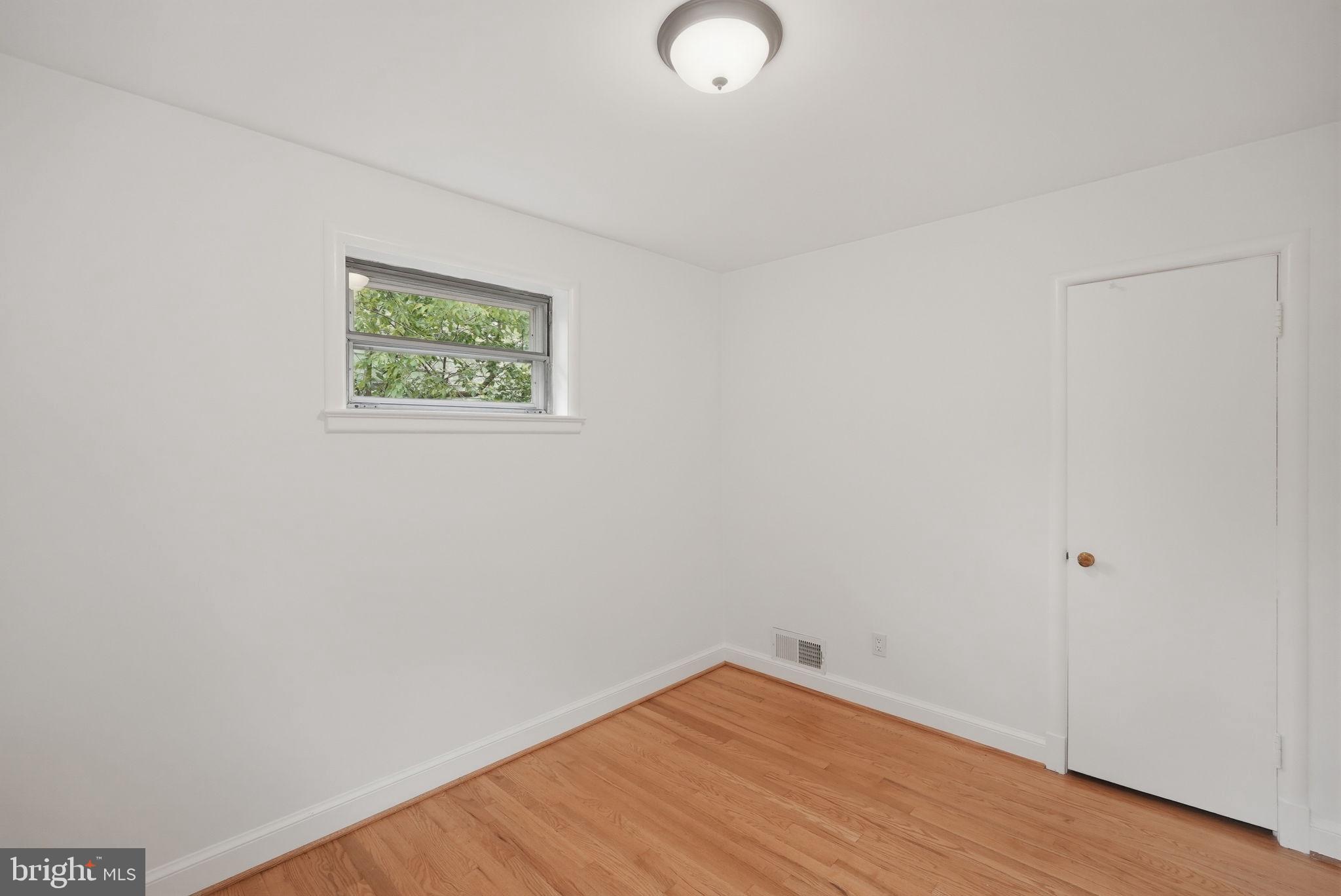 10207 Brunswick Avenue Silver Spring, MD 20902 - Photo 17 of 34 Second Bedroom