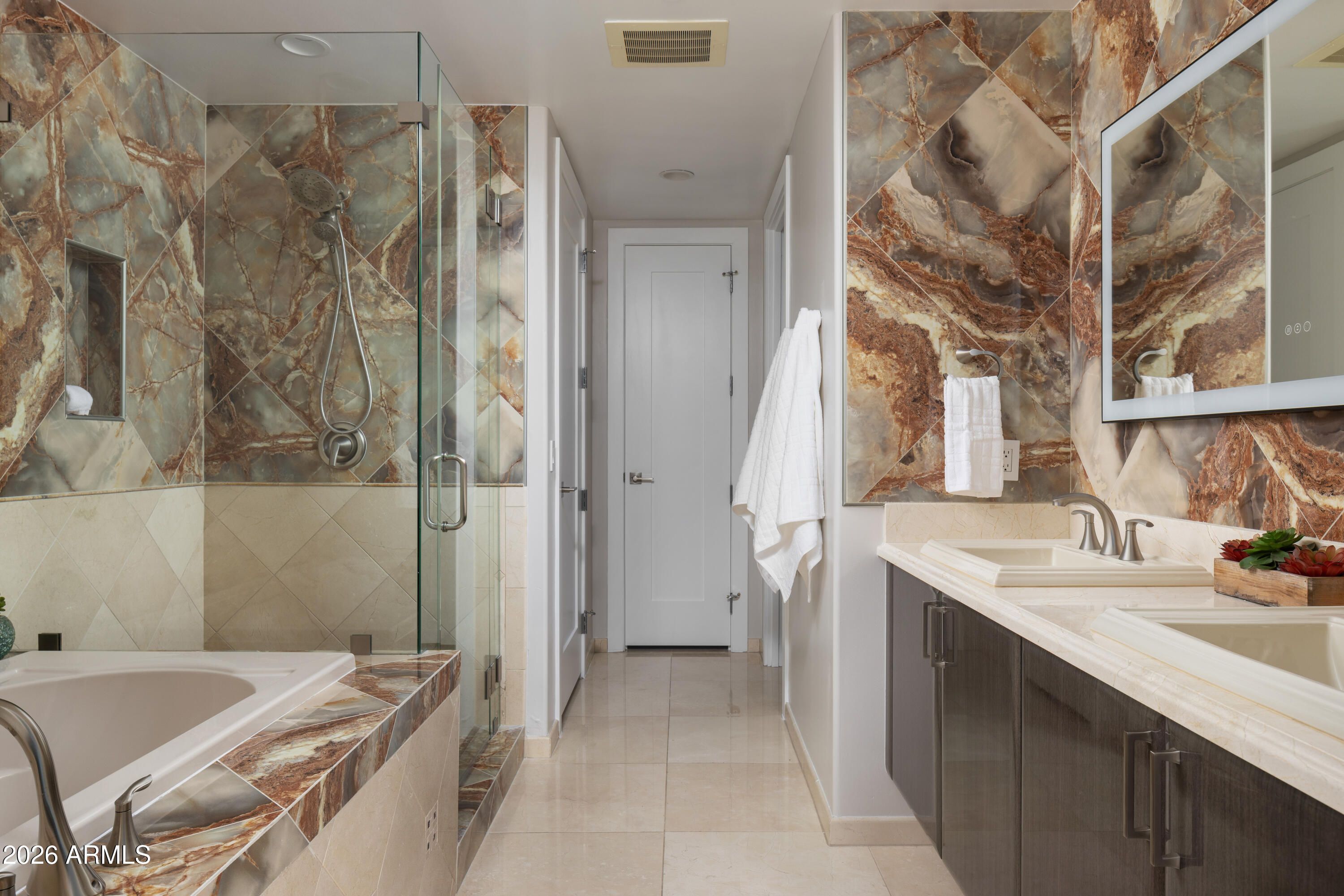 140 East Rio Salado Parkway, Unit 1101 Tempe, AZ 85281 - Photo 14 of 24 a bathroom with a double vanity sink and a mirror