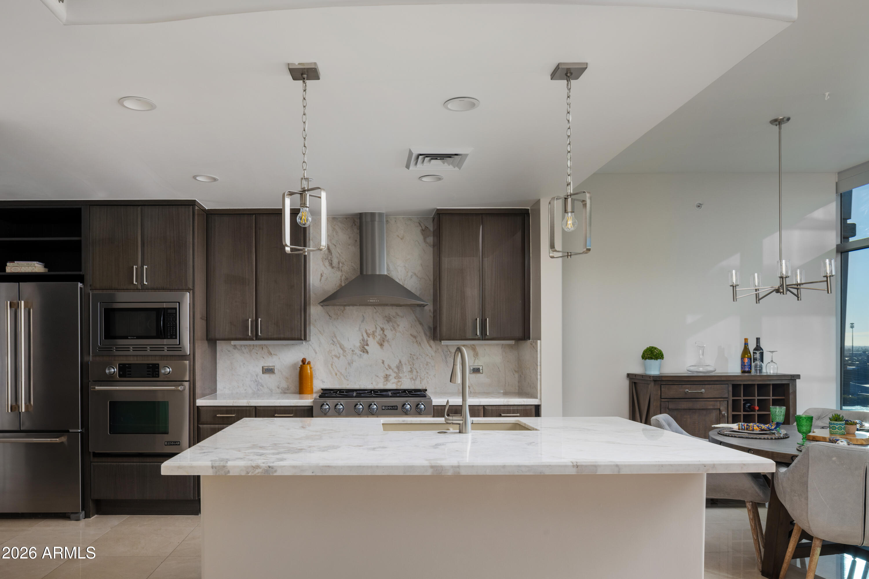 140 East Rio Salado Parkway, Unit 1101 Tempe, AZ 85281 - Photo 6 of 24 a kitchen with a sink a stove and refrigerator