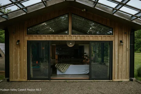 a wooden bench sitting in the middle of a forest