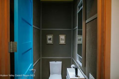 a view of a door and chair in the room