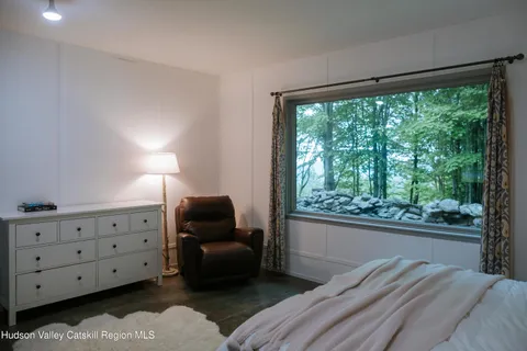 a view of a valley with a mountain in the background