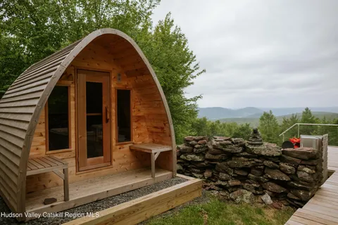 aerial view of a house with a garden