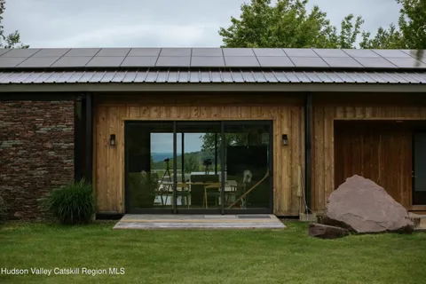 a view of an entryway with a workspace