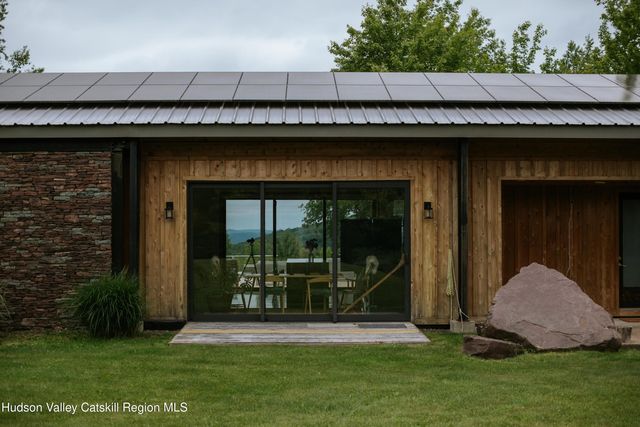 a view of an entryway with a workspace