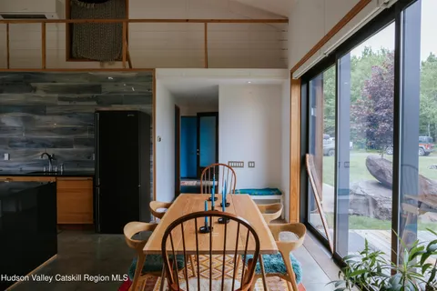 a kitchen with stainless steel appliances granite countertop a stove and cabinets