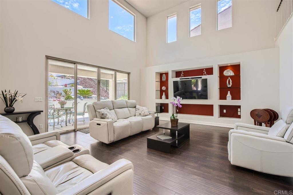 431 Machado Way Vista, CA 92083 - Photo 12 of 36 a living room with furniture and a large window
