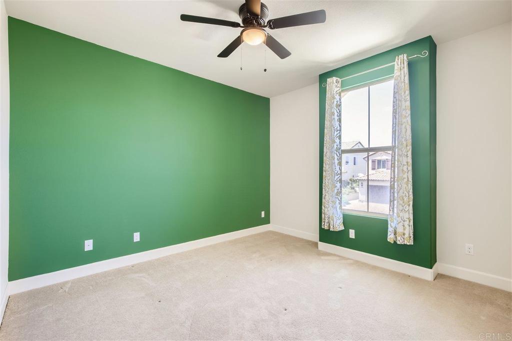 431 Machado Way Vista, CA 92083 - Photo 24 of 36 a view of an empty room with a window