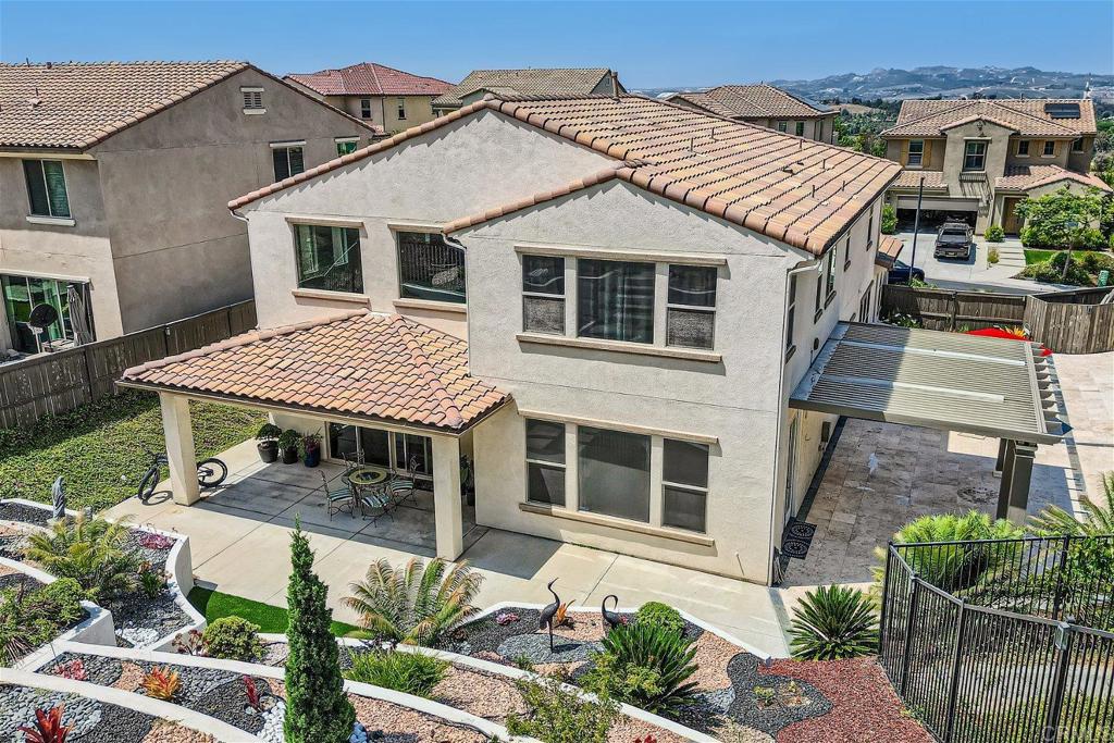 431 Machado Way Vista, CA 92083 - Photo 30 of 36 a front view of a house with a porch