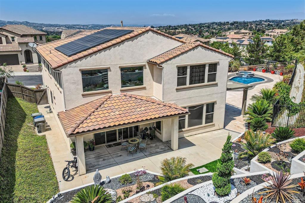 431 Machado Way Vista, CA 92083 - Photo 31 of 36 a aerial view of a house with a yard