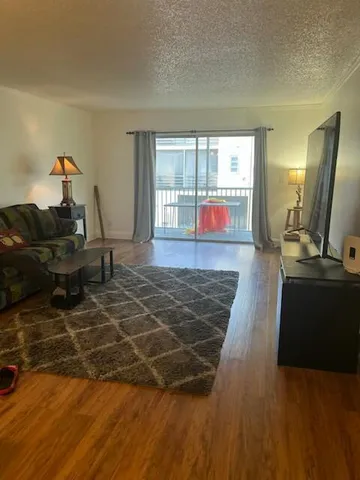 a living room with a couch and a table