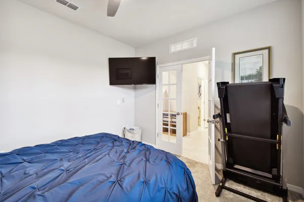 a large kitchen with a table and chairs in it