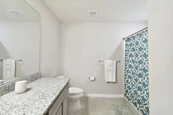 a view of a livingroom with a flat screen tv