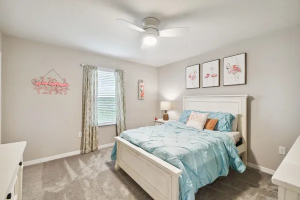 a room with furniture and flat screen tv