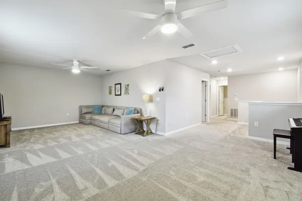 a view of a house with patio and garden