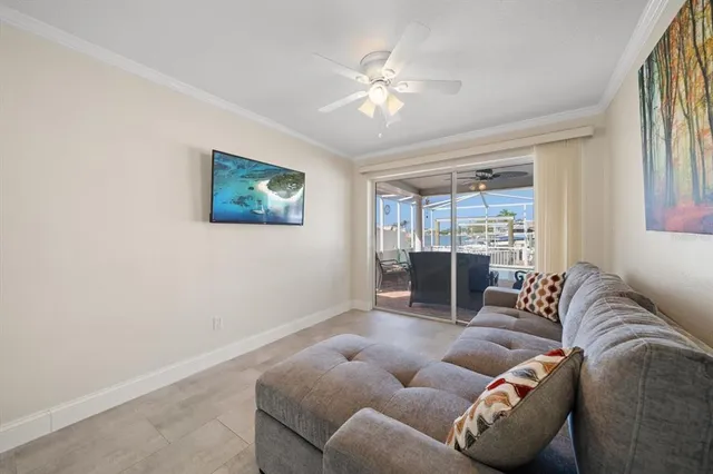 a kitchen with cabinets appliances a sink and a window