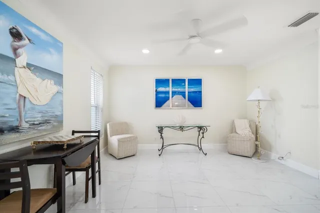 a view of livingroom with furniture and windows
