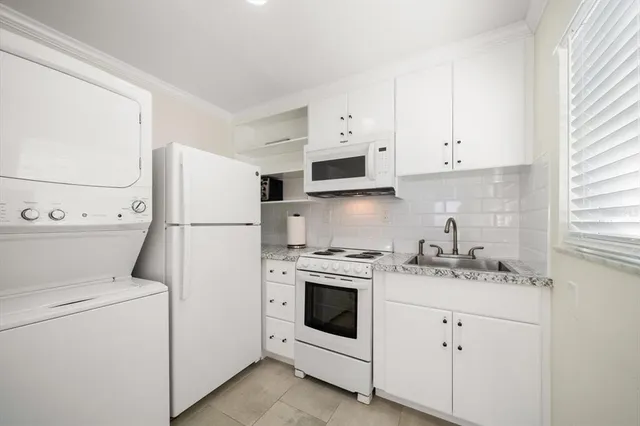 a view of a park with large trees