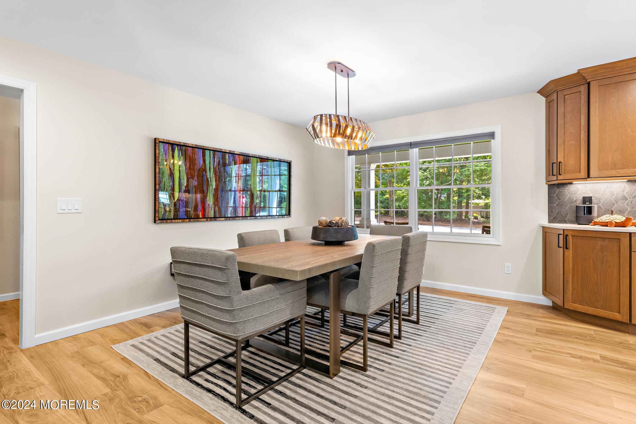 343 Easy Street Howell, NJ 07731 - Photo 17 of 53 a view of a dining room with furniture window and wooden floor