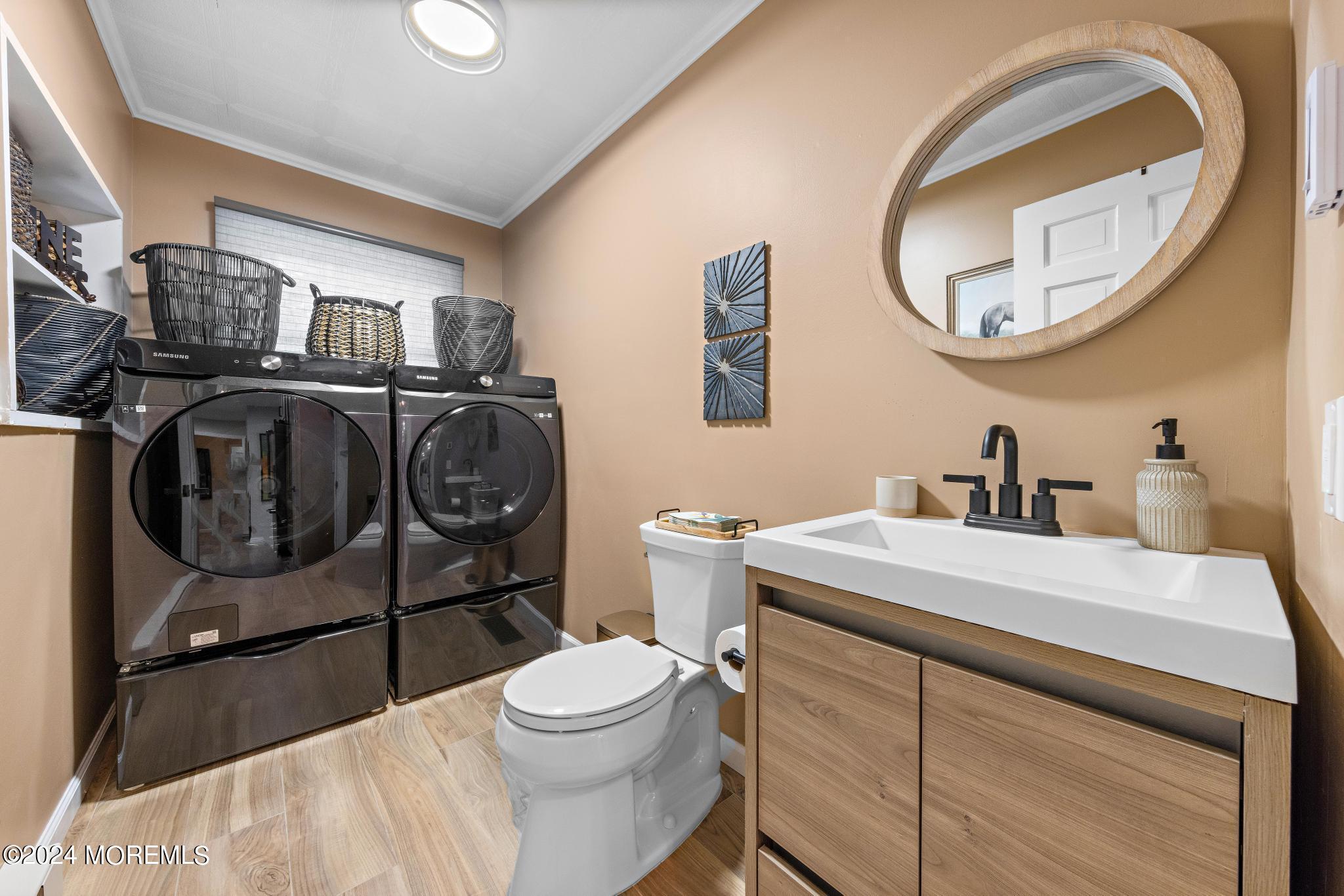343 Easy Street Howell, NJ 07731 - Photo 19 of 53 a bathroom with a sink mirror vanity and toilet