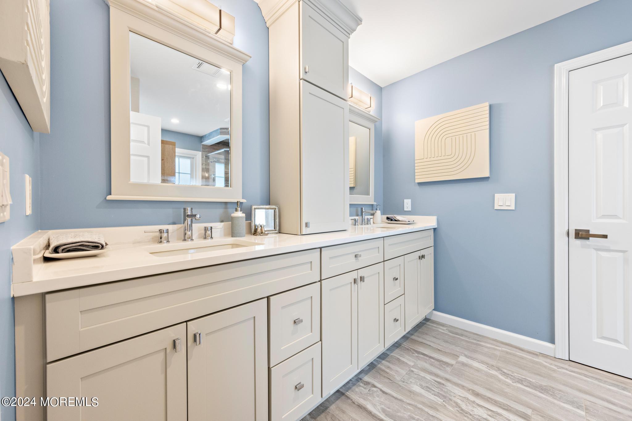 343 Easy Street Howell, NJ 07731 - Photo 23 of 53 a bathroom with double sink and a mirror