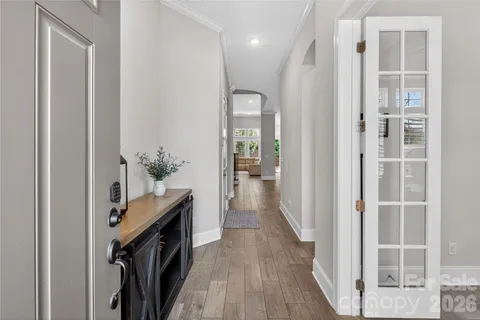 a view of a hallway and interior of a house