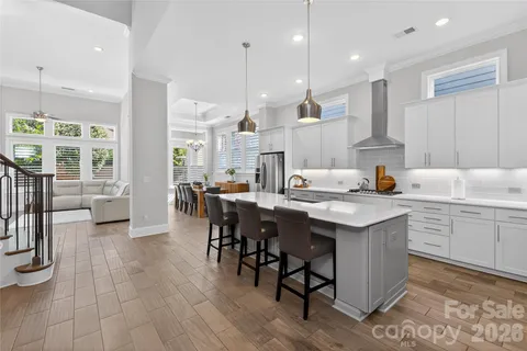 a kitchen with counter space sink appliances and cabinets