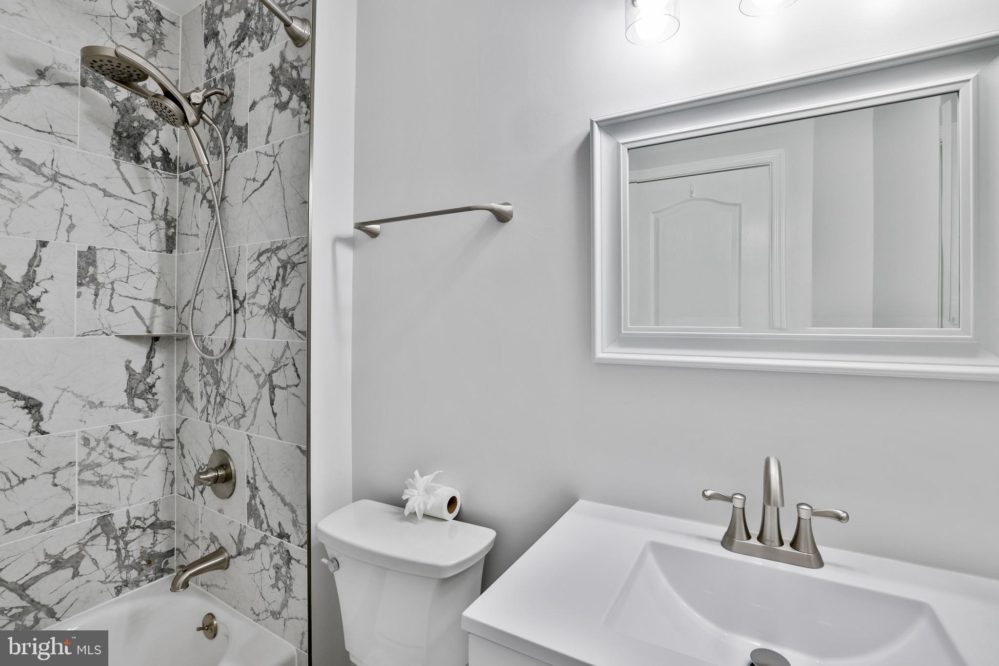 26215 Ocala Circle Chantilly, VA 20152 - Photo 28 of 50 a bathroom with a sink and toilet