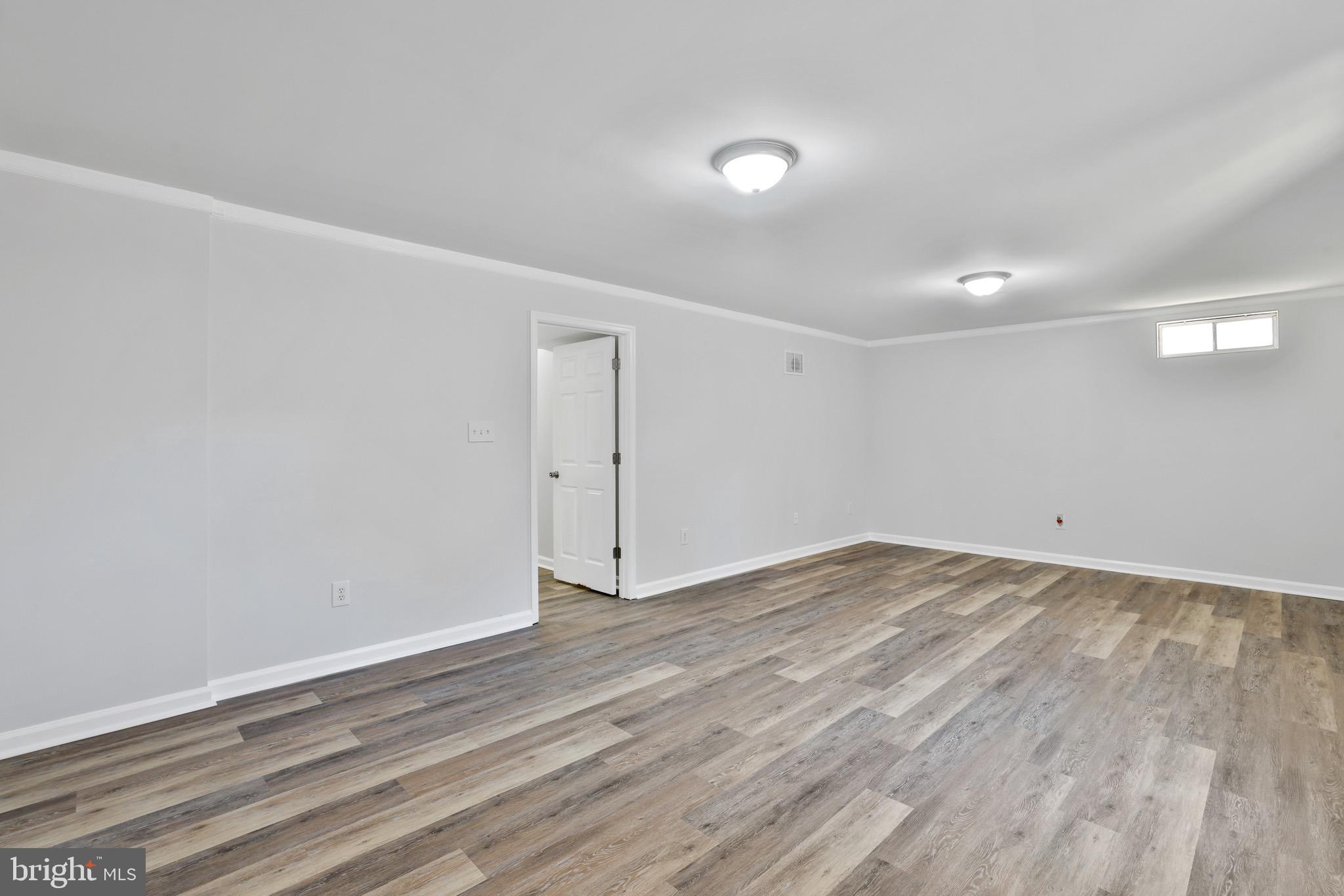 26215 Ocala Circle Chantilly, VA 20152 - Photo 36 of 50 a view of empty room with wooden floor