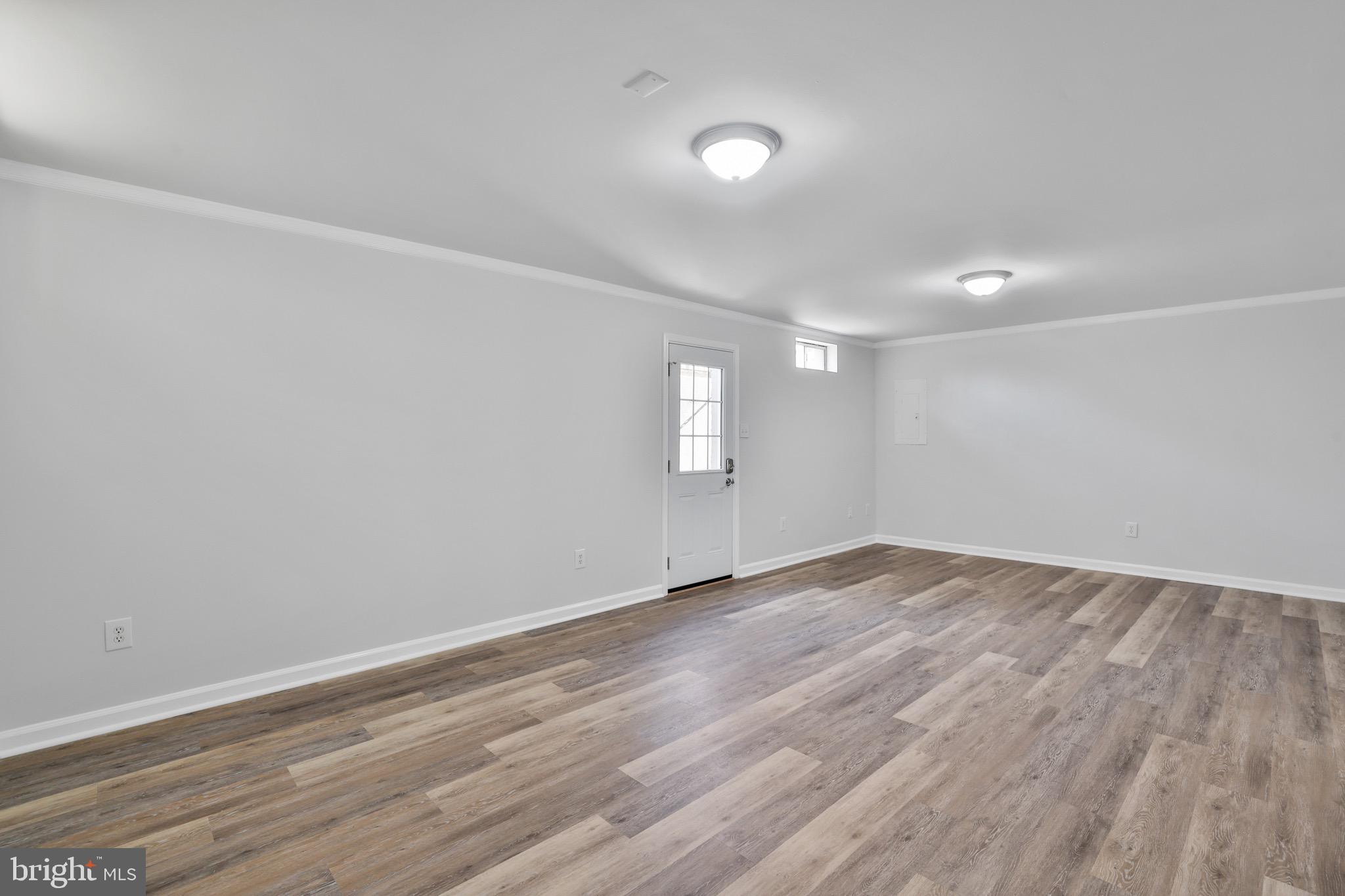 26215 Ocala Circle Chantilly, VA 20152 - Photo 37 of 50 an empty room with wooden floor and window